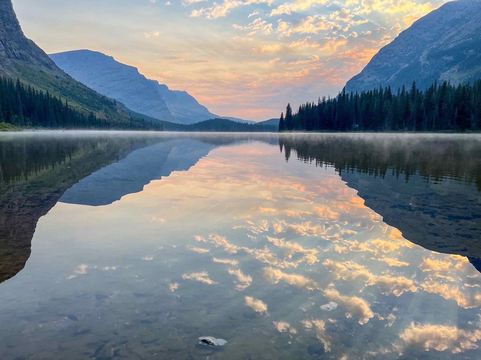 a view of lake josephine during sunrise