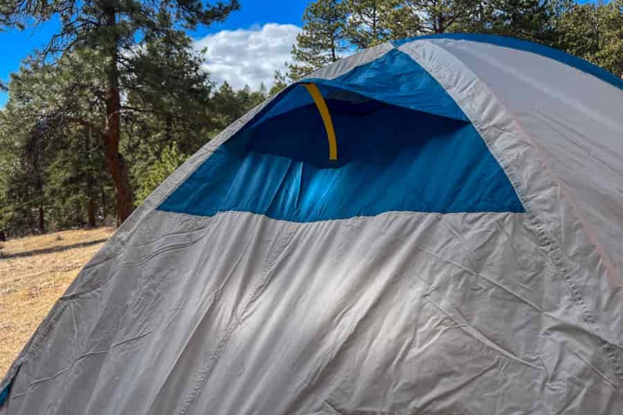 A kickstand vent on the rainfly of a tent.