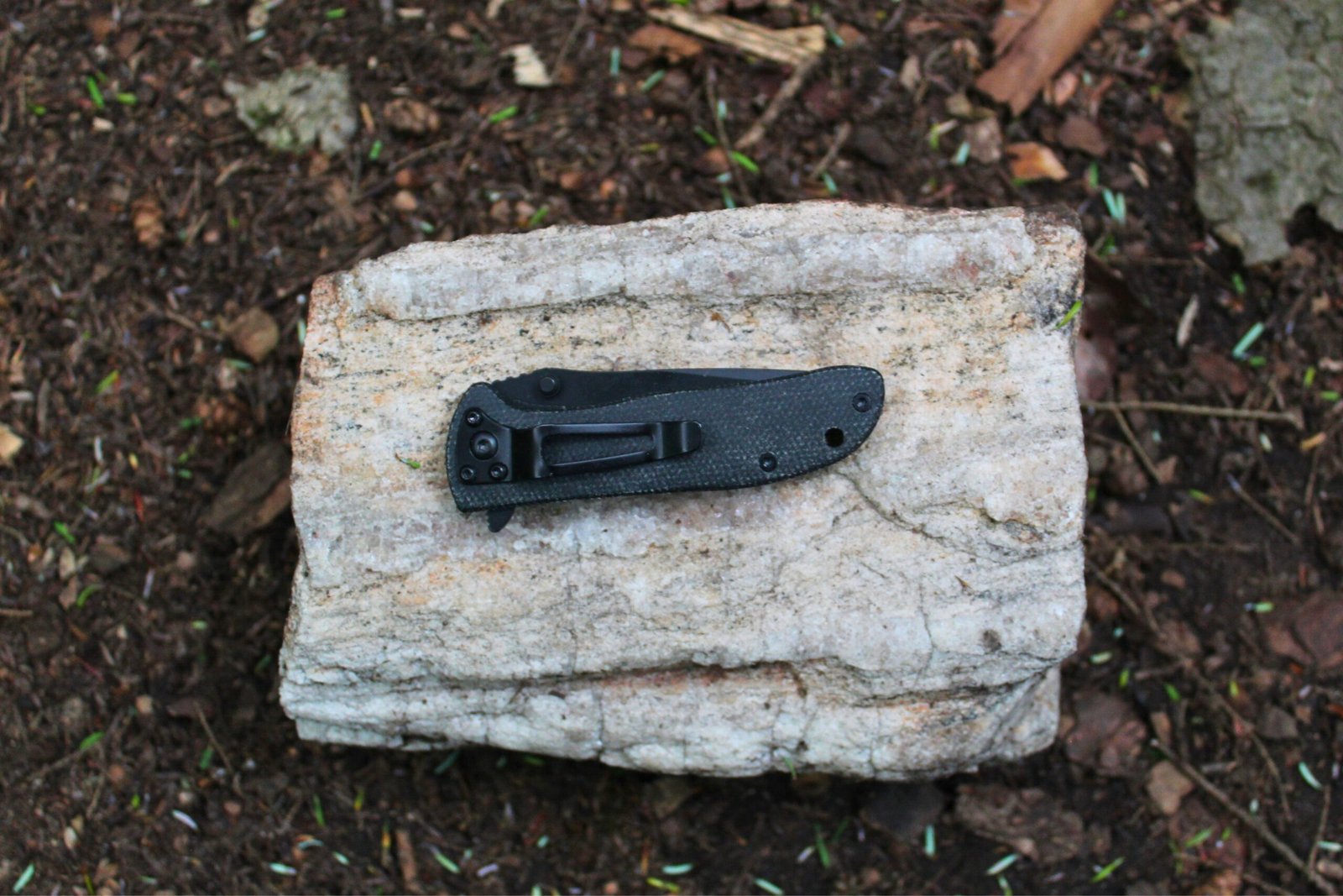 The CRKT Drifter Pocket Knife closed on a rock