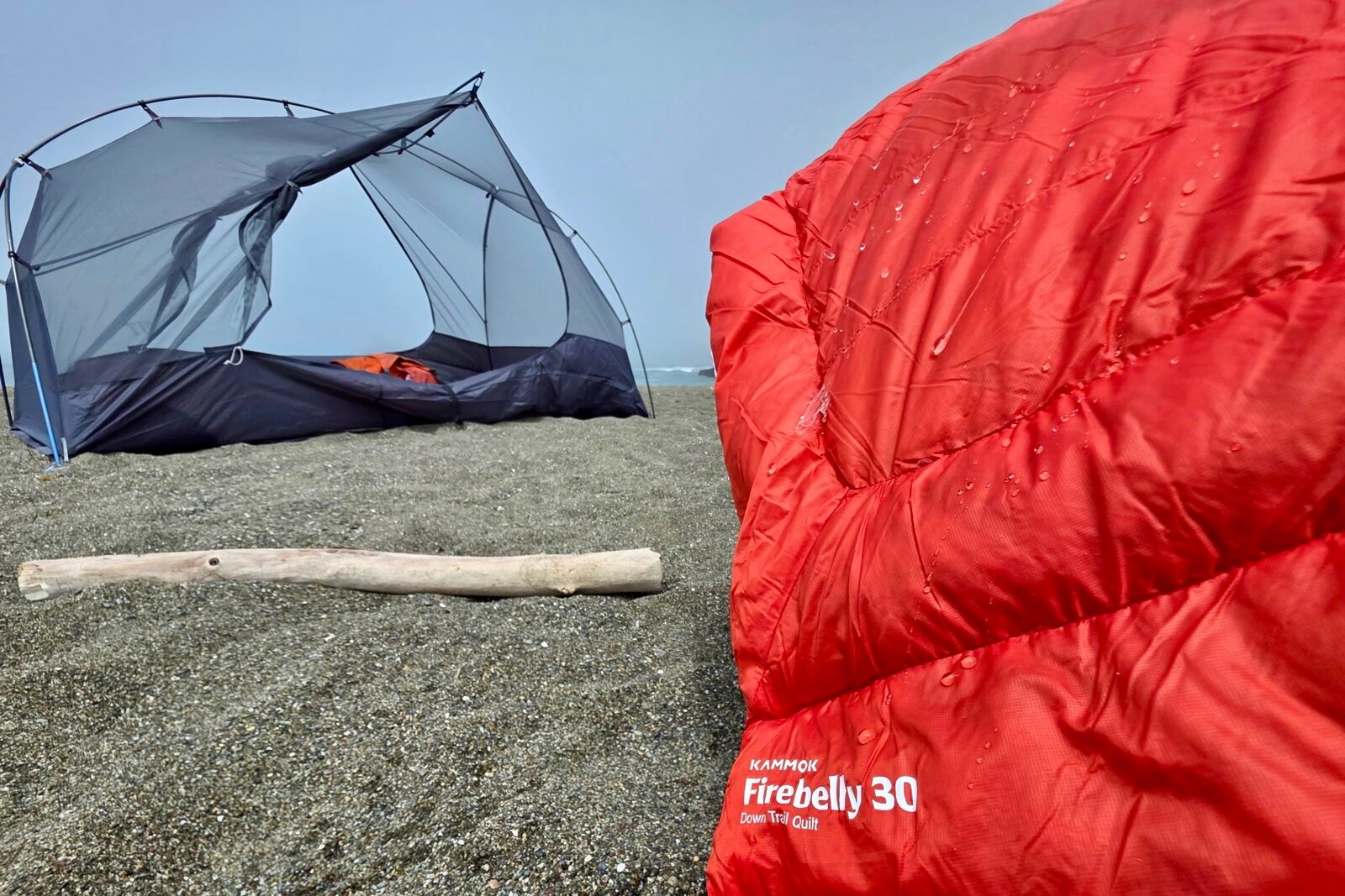 Water drips off the DWR coated camping blanket.