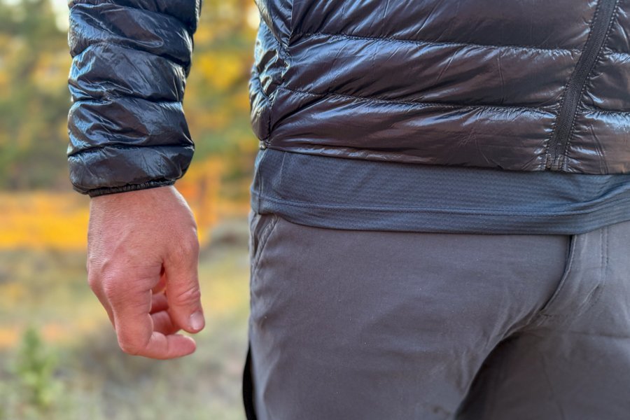 Close-up of the jacket’s cuff and hem detail, focusing on the lightweight material and fitted sleeve design.