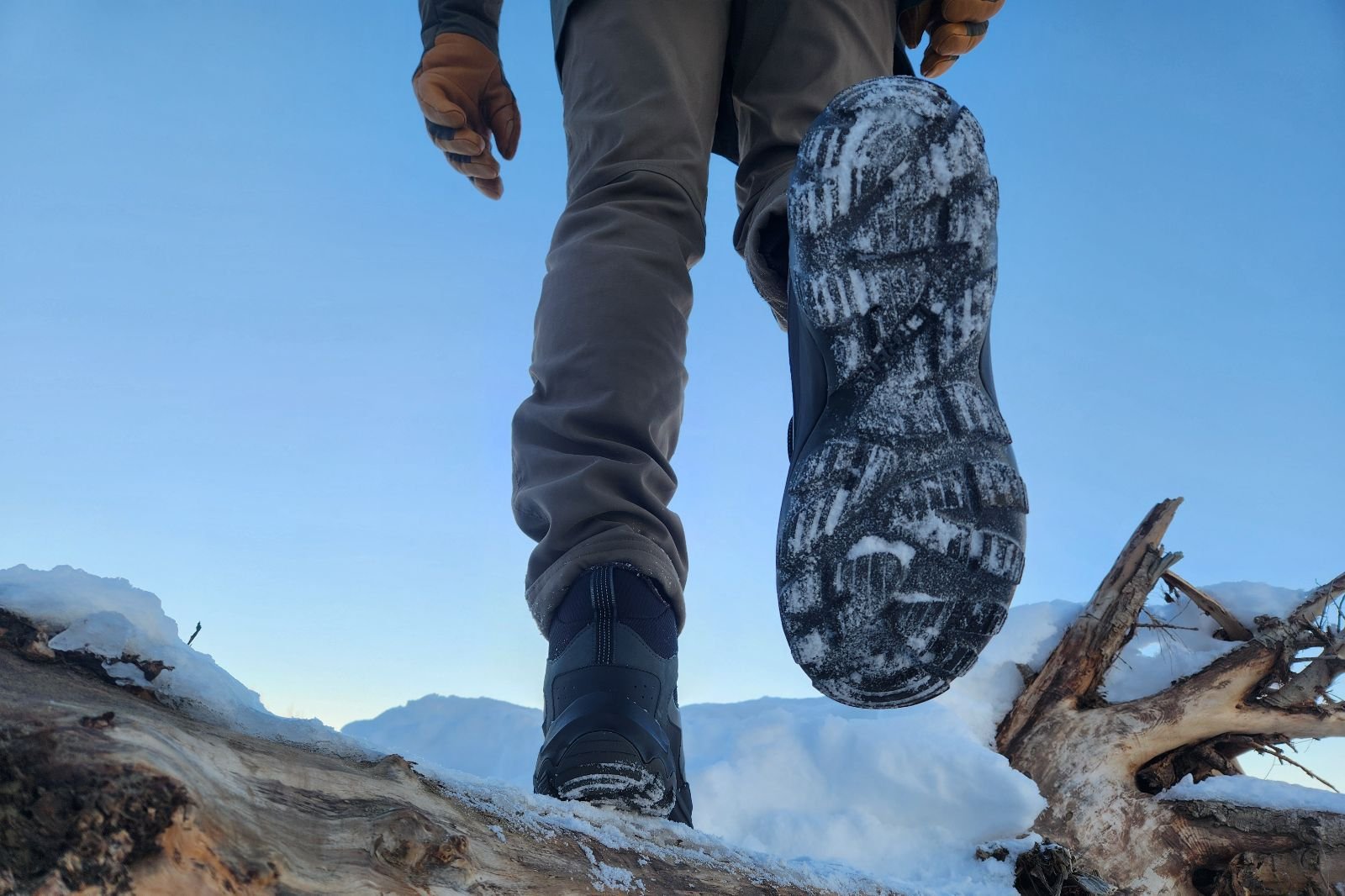 A closep of the tread of winter boots.