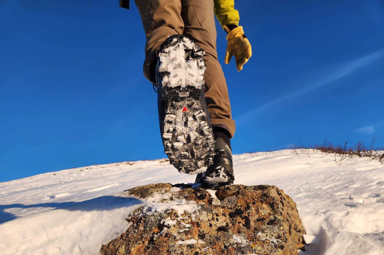 A closeup of the tread of winter boots.